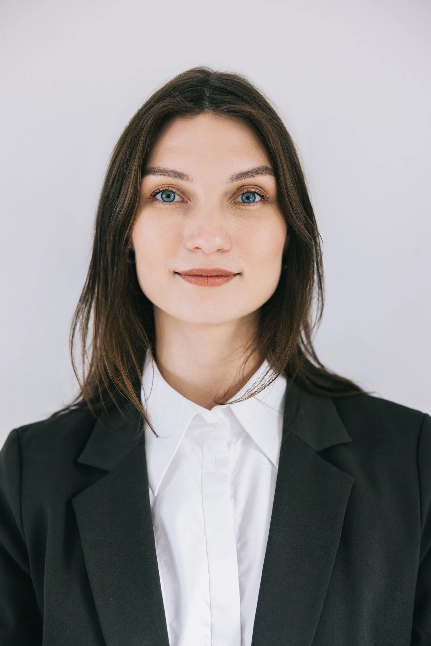Professional headshot placeholder for the principal broker